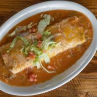 Los Portales Burrito · Diced shrimp sautéed with onions and bell, peppers. Smothered in salsa Blanca and cheese. Se...