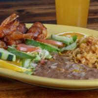 Camarones Rellenos · Shrimp stuffed with cheese and wrapped in bacon.  Served with rice, beans, tortillas and a l...