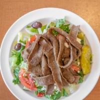Gyros Salad · Gyros meat on a mix of green leaf and romaine lettuce, tomatoes, onions, cucumbers, bell pep...