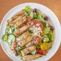 Chicken Greek Salad · Grilled breast of chicken on mix of green leaf and romaine lettuce, tomatoes, onions, cucumb...