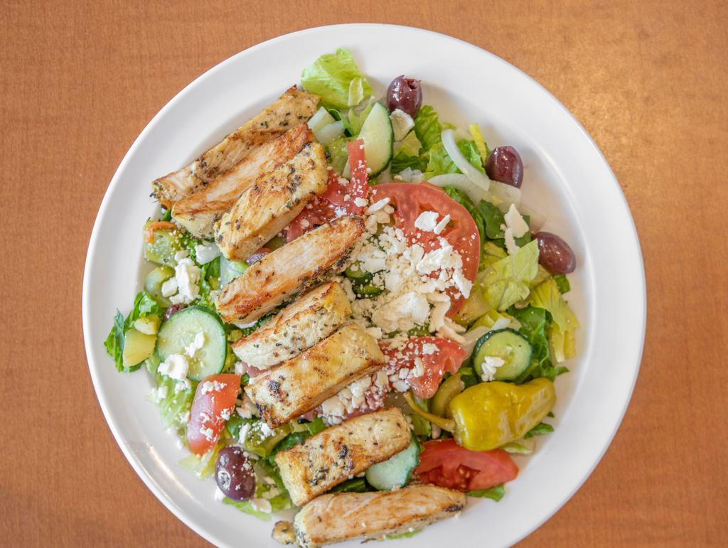 Chicken Greek Salad · Grilled breast of chicken on mix of green leaf and romaine lettuce, tomatoes, onions, cucumbers, bell peppers, feta cheese, pepperoncini and olives with greek dressing and tzatziki sauce.
