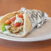Chicken Pita · Greek style marinated chicken breast served with lettuce, onions, tomatoes and tzatziki sauc...