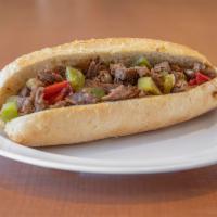 Philly Cheese Steak · Shaved rib eye steak served with mayo, grilled onions, bell peppers, and swiss cheese on fre...
