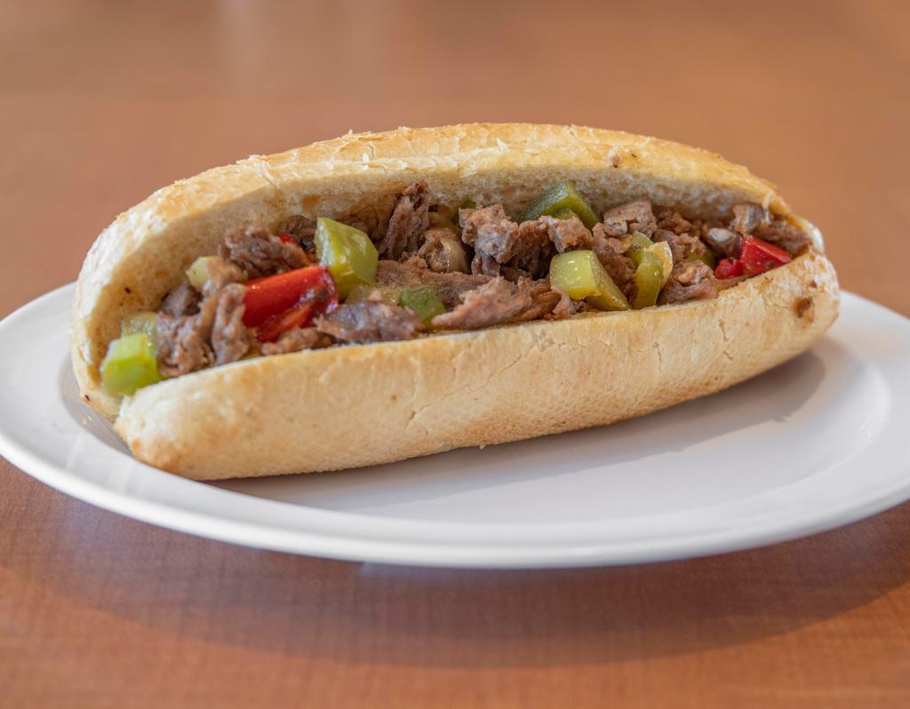 Philly Cheese Steak · Shaved rib eye steak served with mayo, grilled onions, bell peppers, and swiss cheese on french bread.