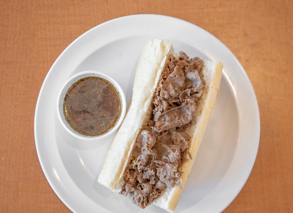 Italian Beef · Chicago style beef dipped served on french bread. We recommend adding hot or sweet peppers and cheese.