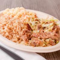 Island Inspired Pork And Cabbage · Slow roasted and hand shredded pork seasoned with Himalayan salt, garlic and pepper, simmere...