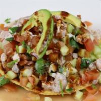 Tostada Ceviche De Camaron · Tradicional tostada de ceviche de camaron curtido en limon, pepino, tomate y cebolla. 
Tradi...