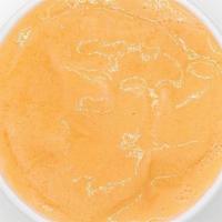 Omg Creamcicle · Orange juice, almond milk, orange sherbet, and non-fat frozen yogurt.