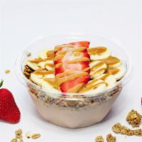 P-Nut Butter Crunch Bowl · Blend includes: Vanilla Yogurt, Peanut Butter, Strawberries, & Bananas. Topped with: Nut-fre...