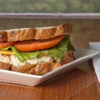 Metro Tuna Melt ( Hot ) · Premium albacore tuna, vermont cheddar cheese, lettuce, tomato. Sandwich comes on your choic...