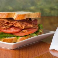 L.T. · Boar’s Head bacon, lettuce, tomato. Sandwich comes on your choice of bread.