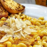 Hog Heaven Mac N Cheese · Bacon, pulled pork, smoked ham and house roasted garlic in our rich, house made Brown Ale ch...