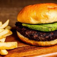 Maui Burger · Grilled beef patty served on a toasted bun and topped with grilled pineapple avocado and ter...