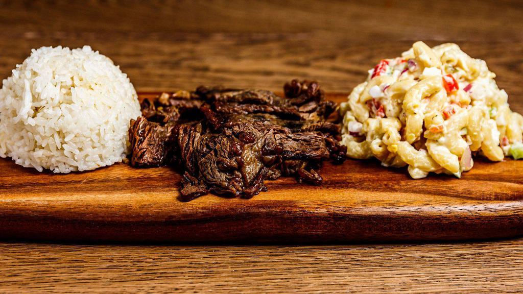 Teriyaki Beef Plate · Thinly sliced sirloin, marinated in homemade teriyaki and grilled served with a side of white rice and macaroni salad.