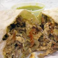 Breakfast Burrito · Comes with scramble eggs, green bell peppers, onions, meat only beef, chicken, fried pork, s...