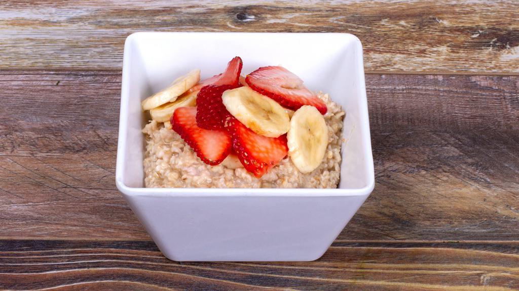 Power Oatmeal Breakfast · Organic Oatmeal topped with Banana, Strawberry and
 a touch of Organic Agave Nectar. 
(430cal 17protein 67carb 113at)
Vegetarian Friendly/Vegan Friendly
