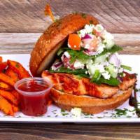 Mediterranean Salmon Burger · Pan Seared Atlantic Salmon, Baby Spinach, Tomato, crumbled Feta Cheese, Cucumbers, Red Onion...