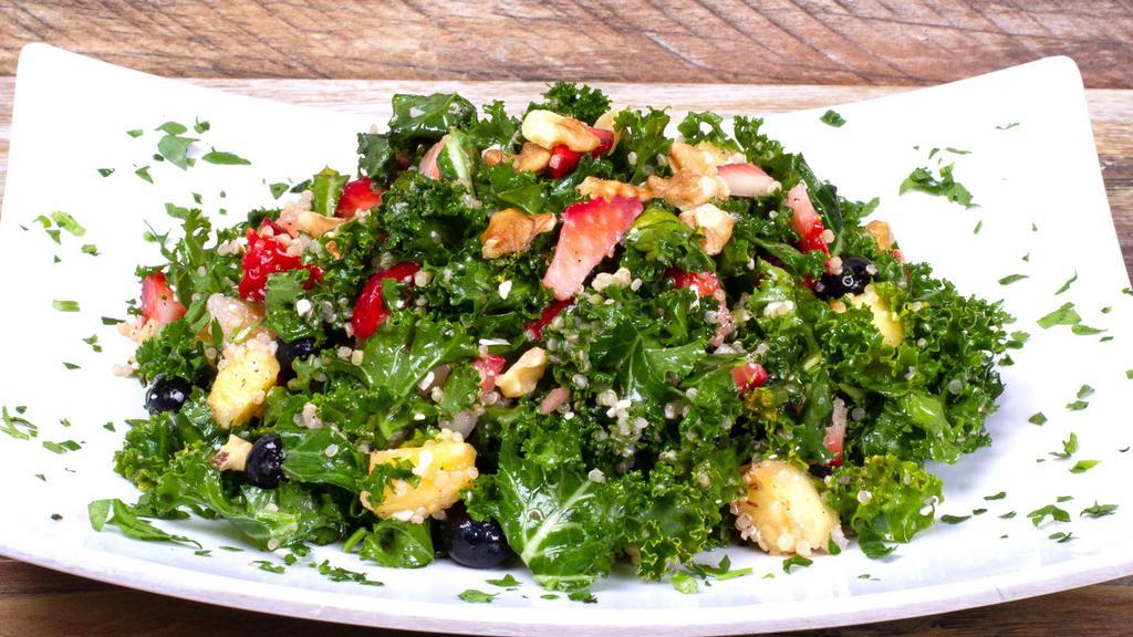 Green Bomb Salad · Fresh Chopped Kale, Organic Quinoa, Source Salad Mix, Pineapple, Strawberries, Walnuts, Blueberries and Crumbled Feta Cheese tossed with House Made Dijon Balsamic Vinaigrette. 
(330cal 10protein 33carb 20fat)
Vegetarian Friendly/Gluten Free/Contains Dairy/Contains Nuts
