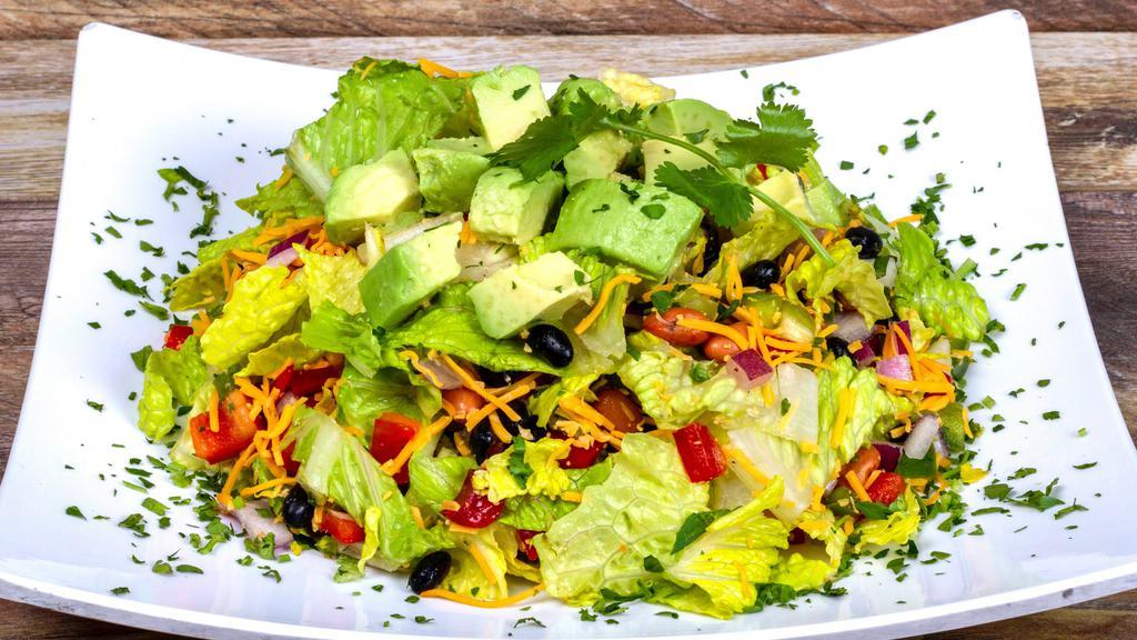 Western Avocado Salad · Fresh Cut Romaine Lettuce, Black and Pinto Bean Salsa, Red and Green Bell Peppers, Red Onions, Avocado, Shredded Cheddar, House Made Cilantro Pesto and Dijon Balsamic. 
(350cal 10protein 18carb 28fat)
Vegetarian Friendly/Keto Friendly/Gluten Free/Contain Dairy