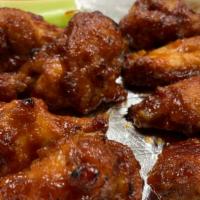 Buffalo Chicken Wings 12 Pc · Available in 5 flavors: Hot n' Spicy, BBQ, Mango Habanero, Teriyaki, and Parmesan Garlic.  C...