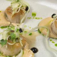 Brown Butter Scallops · roasted celery root puree, black garlic,
green apple, lemon vinaigrette