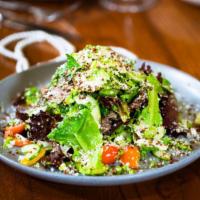 The House Salad · leafy greens, shaved cauliflower, broccolini, Grana, cucumber, crunchy quinoa, red wine vina...