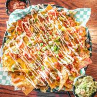 Legendary Nacho · Fresh cooked corn chips layered with Pico de Gallo, jalapeños and melted cheddar/jack cheese...