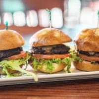 Kobe Sliders · Three petite sharp cheddar cheeseburgers complete lettuce, tomato, and mayo on soft grilled ...