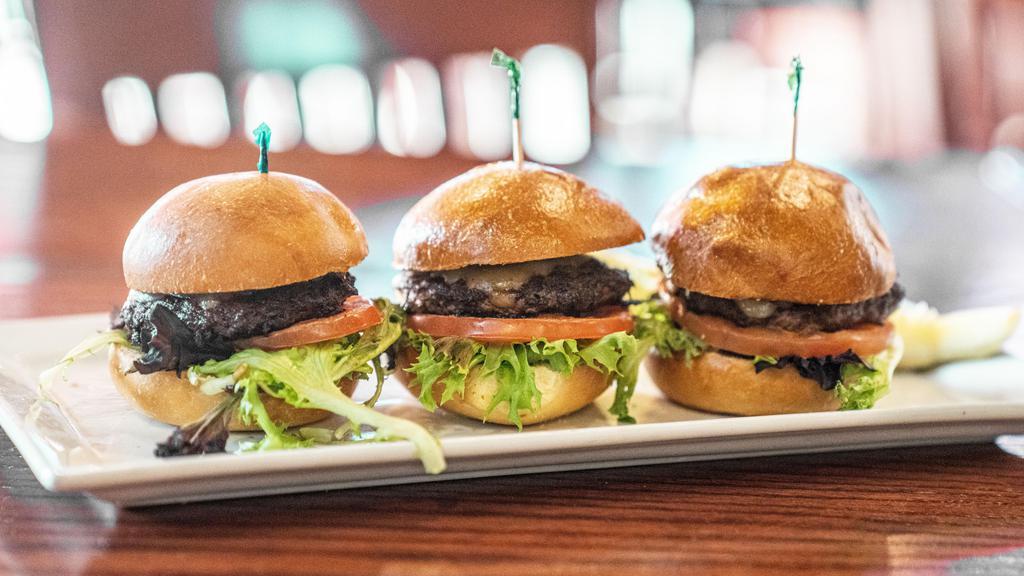 Kobe Sliders · Three petite sharp cheddar cheeseburgers complete lettuce, tomato, and mayo on soft grilled buns.
