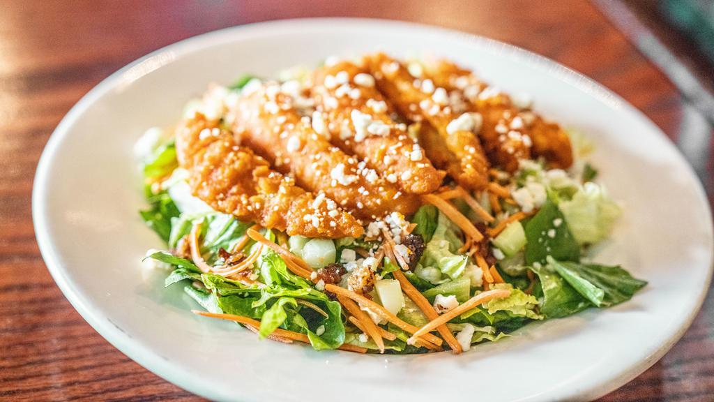 Fire And Ice · Buffalo chicken and bacon bits on a bed of romaine with carrots and celery tossed n stout blue cheese dressing and blue cheese crumbles.