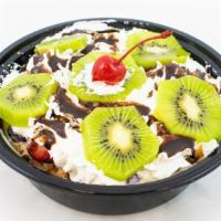 Escamocha · this is a plate with 4 exotic fruits with lechera granola whipped cream and chocolate and de...