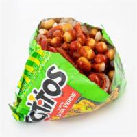 Tostitos Large · it is a dish with tostitos jicama mango cucumber japanese peanuts with chamoy tajin valentin...