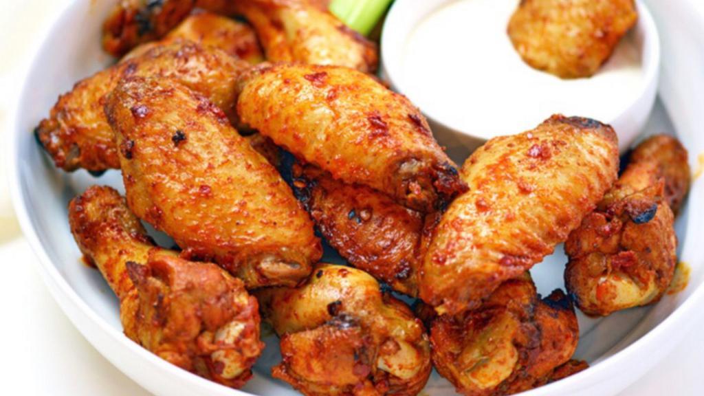 Chicken Wings · Cajun, garlic, sweet chili, mango, or korean