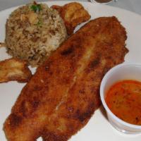 Blackened Catfish · Battered catfish fillet and shrimp served with a side of white rice.