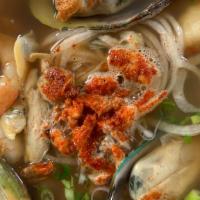 Spicy Seafood Ramen · Shrimp, clams, mussels and crab meat in a seafood broth.