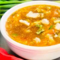 Egg Drop Soup (Chicken) · Stock infused with egg, finely chopped veggies and chicken, herbs, and spices.