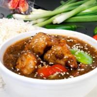 Sesame Chicken · Crispy fried chicken and green peppers in a honey sesame sauce. Served with steamed rice.