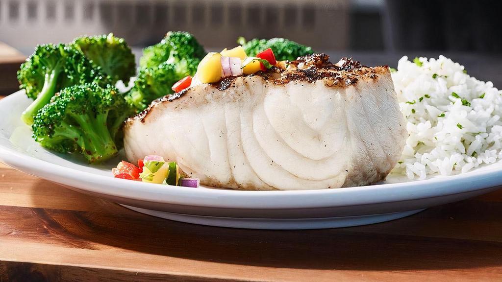 Chilean Sea Bass  · lightly seasoned and wood-grilled and served with choice of two signature sides