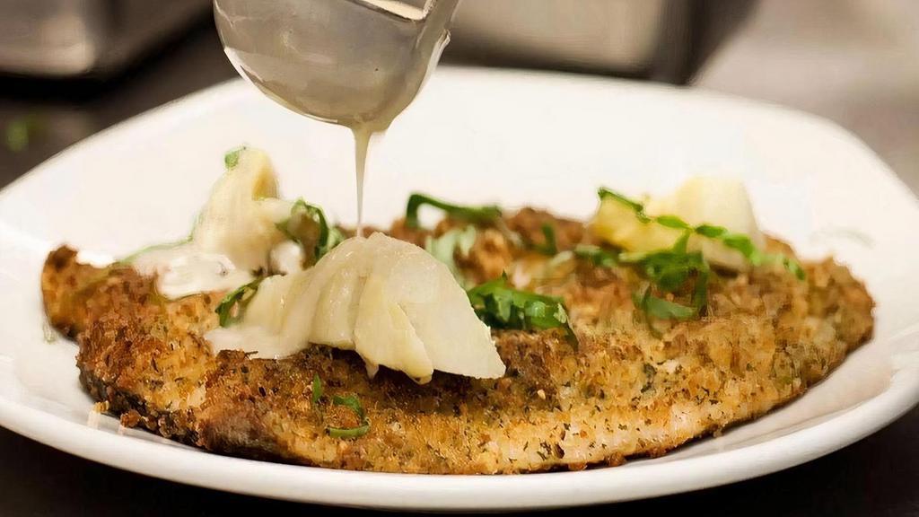 Parmesan-Crusted Rainbow Trout  · Parmesan-Crusted Rainbow Trout topped with artichoke hearts, fresh basil and lemon butter