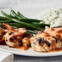 Chicken And Shrimp  · jumbo shrimp, brushed with a light citrus-herb marinade, paired with an 8oz chicken breast