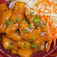 Spicy Tamarind Sauce Bowl · Choice of crispy chicken or crispy tofu mixed with spicy tamarind sauce and topped with gree...
