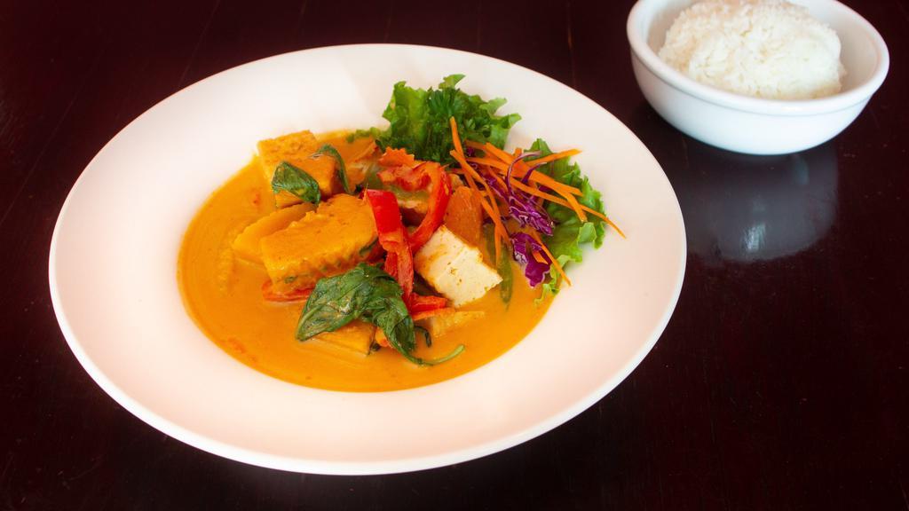 S- 2 Pumpkin Curry · Choices of meat chicken,  tofu or vegetarian with pumpkin, basil leaves, bell pepper, carrot, kaffir leaves, and coconut milk in panang curry paste.