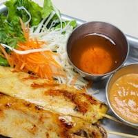 Thai Chicken Satay · Skewers of chicken breast marinated in Thai herbs, spices, and grill. Served with plum sauce...