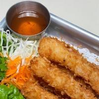 Coconut Shrimp · Coconut breading, shrimps, and deep-fried. Served with sweet-sour sauce.