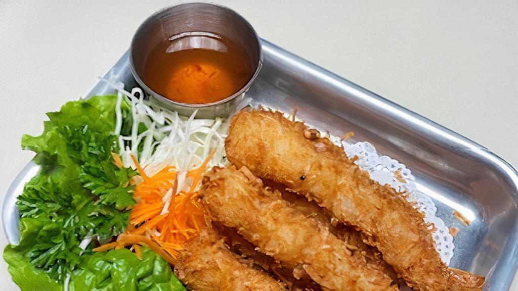Coconut Shrimp · Coconut breading, shrimps, and deep-fried. Served with sweet-sour sauce.