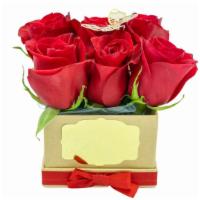 Roses Are Red · Cute 6 rose bouquet with two gold butterflies to symbolize couple.