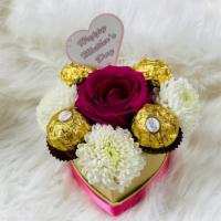 From My Heart To Yours   · Heart shaped Pink rose with white flower and FERRERO chocolate truffle arrangement