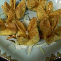 Crab Cheese Wonton · 6 pieces. Creamy cheese blended with crab meat and green onions.