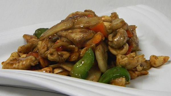 Royal Chicken · Cashew chicken Thai style! White meat chicken, cashews, mushrooms, and vegetables in sweet soy.