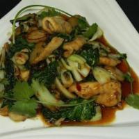 Szechuan Chicken · Sliced of white meat chicken and vegetables tossed in a spicy Szechuan sauce.